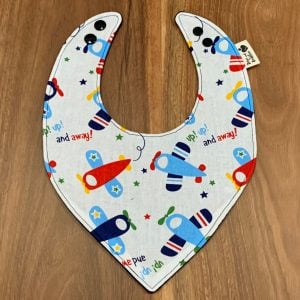 Planes and up up and away text pattern on dribble bib