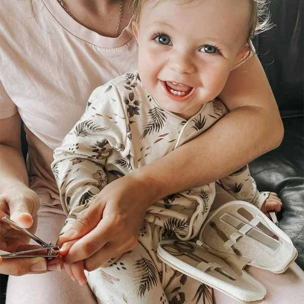 Baby getting nails done Pear-fect Manicure Kit
