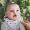 snotty boss nasal aspirator being used on small child